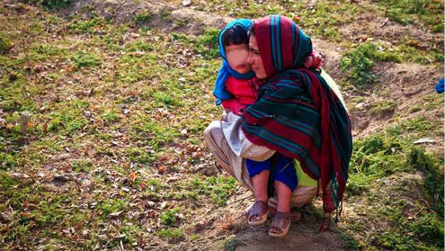 madre bambino profughi migranti