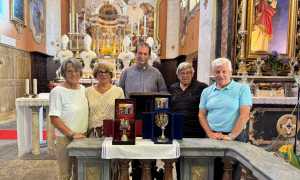 quatro dei cinque fratelli e il parroco