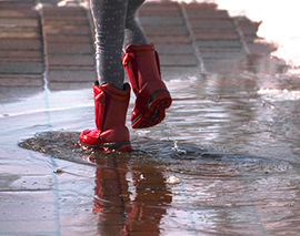 corta pioggia pozzanghera